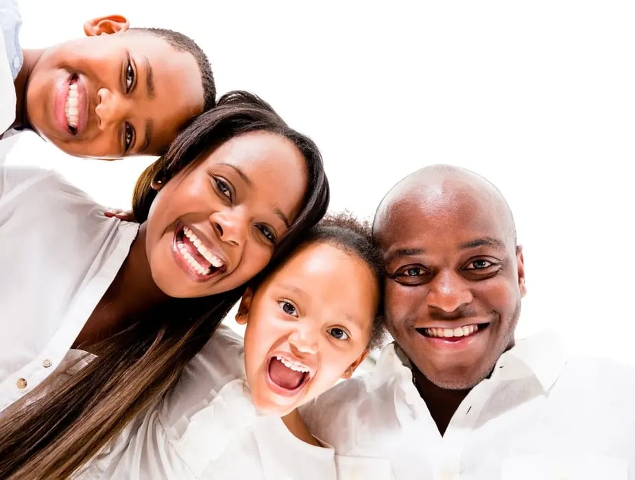 African American family looking very happy - isolated over white background